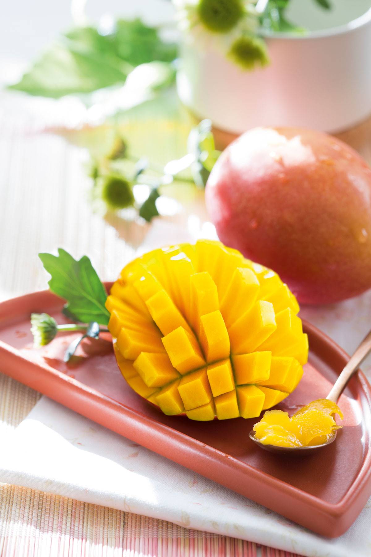Fruta de mango cortada.