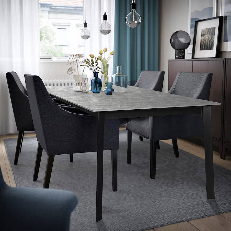 Mesa extensible gillanda en gris oscuro negro de IKEA.