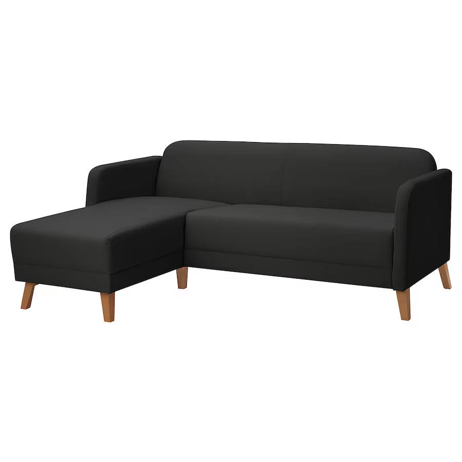Un sofá de estilo retro con chaise longue