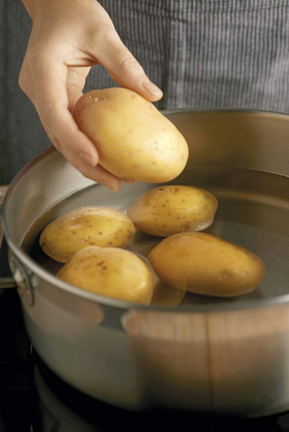Hervir patatas