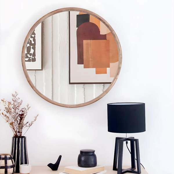 Maisons du Monde baja a la mitad uno de sus espejos más valorados: redondo, con marco de madera y perfecto para decorar
