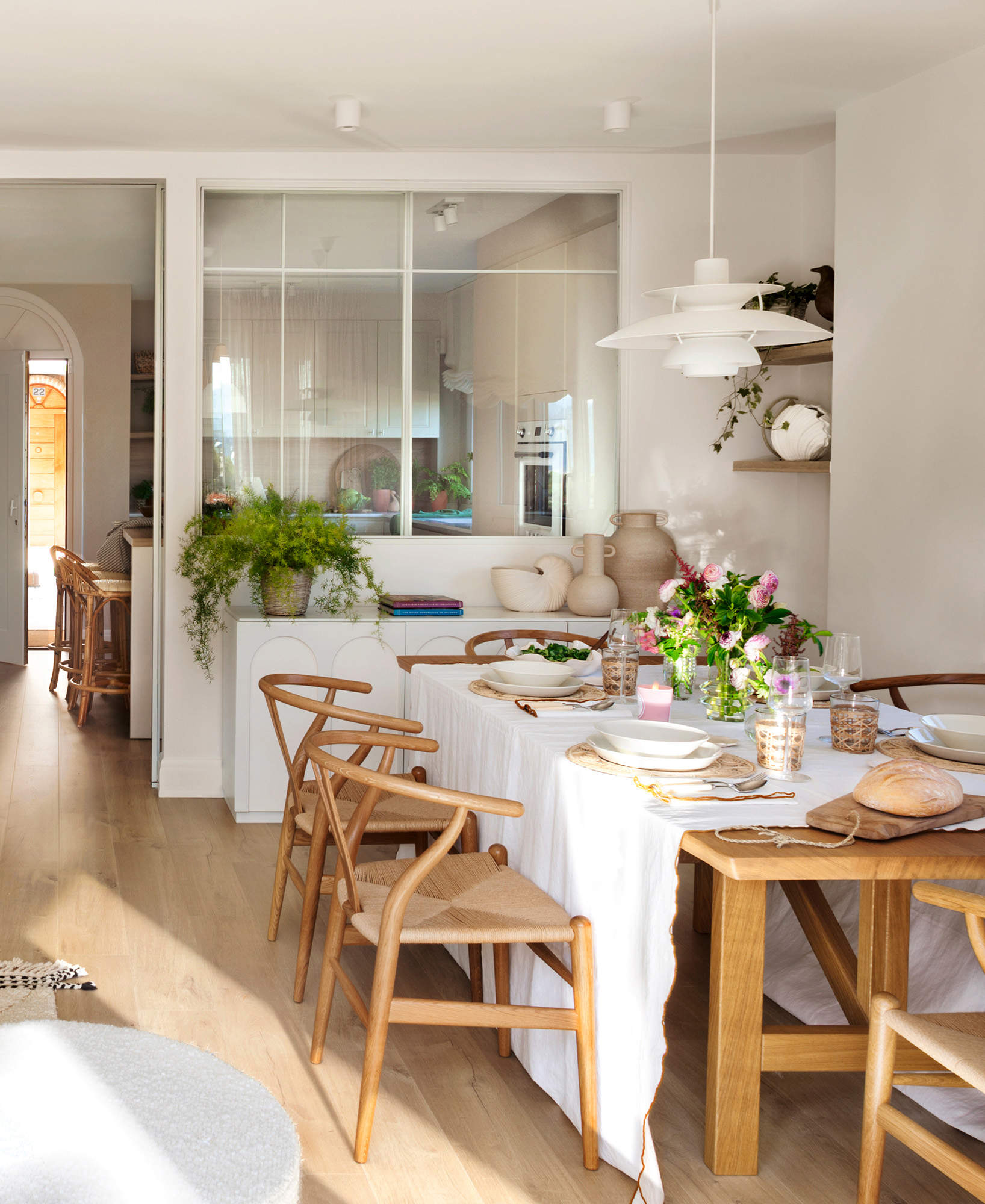 Cerramiento de cristal entre la cocina y el salón-comedor 