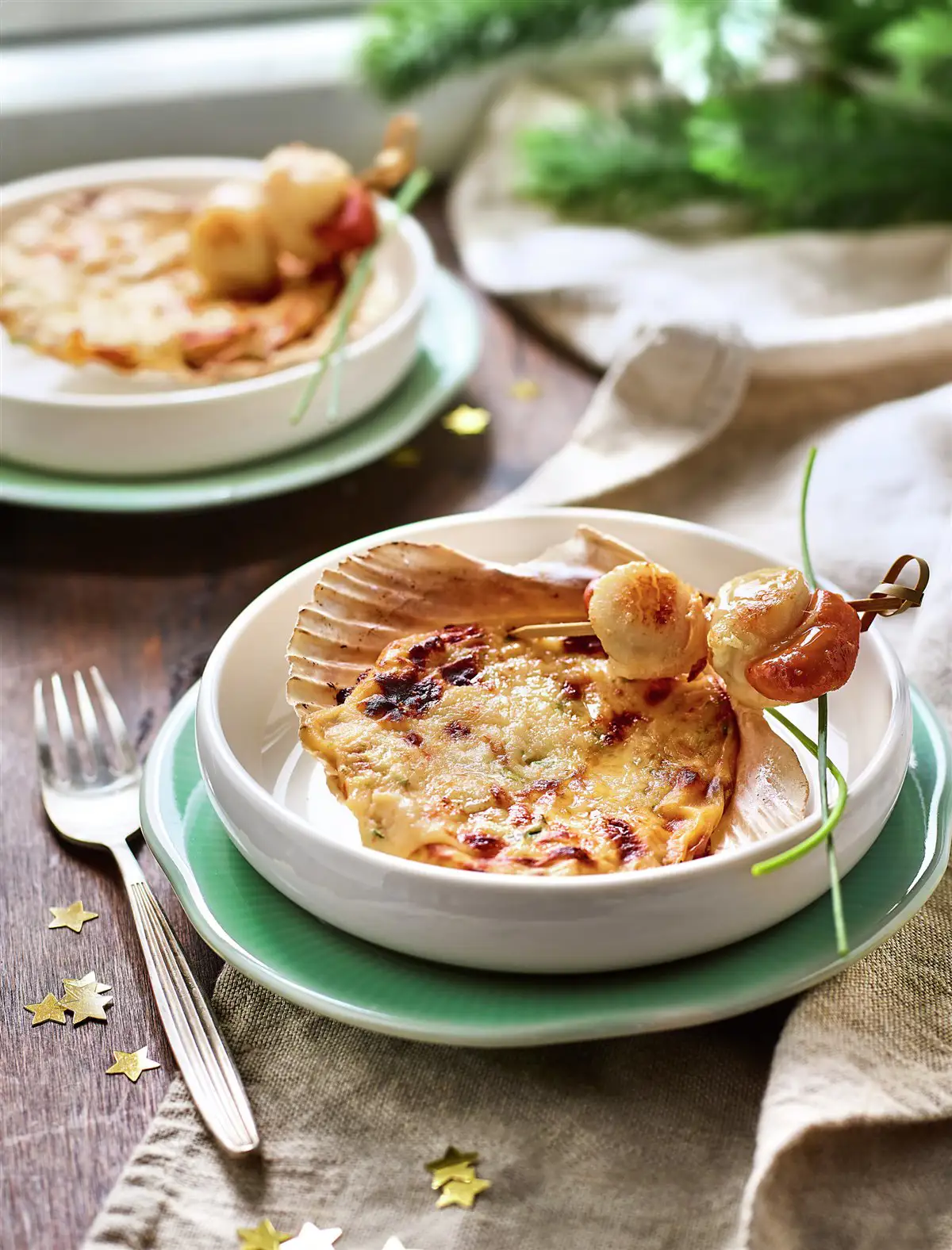 Conchas de merluza, langostinos y vieiras