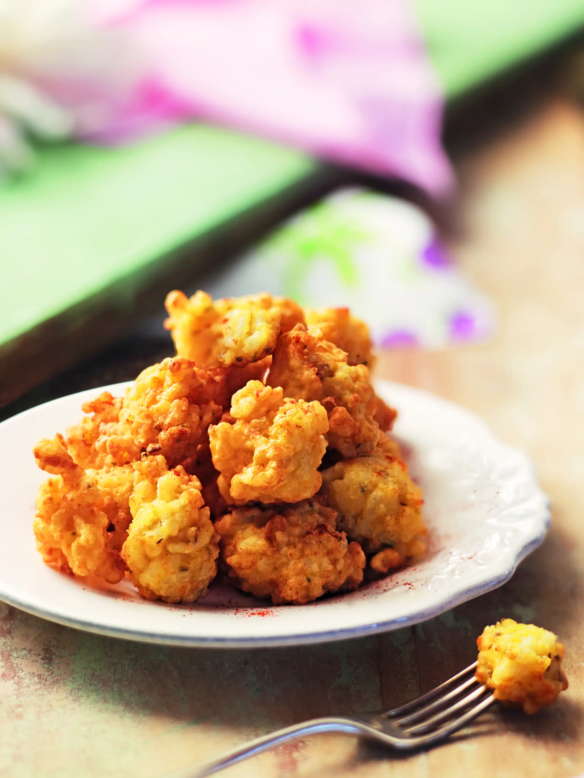 Buñuelos de arroz con queso manchego y orégano