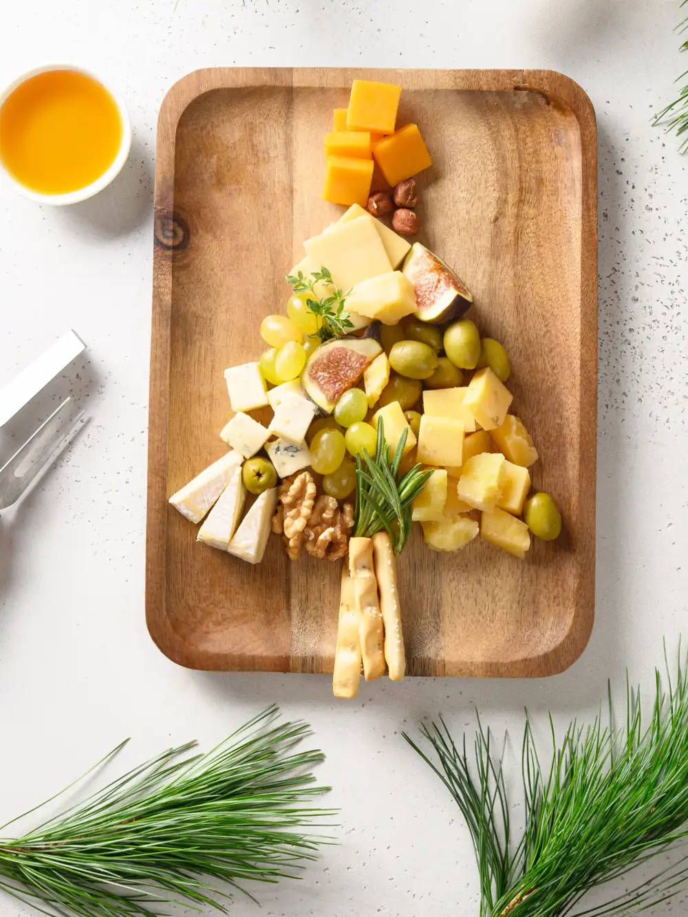 Tabla de quesos con forma de árbol de Navidad