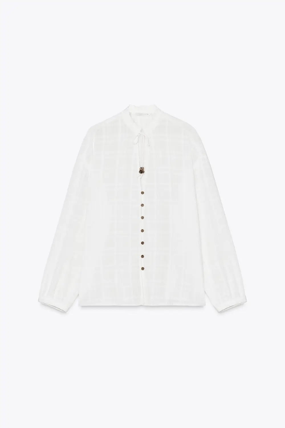 Blusa blanca con botones de madera