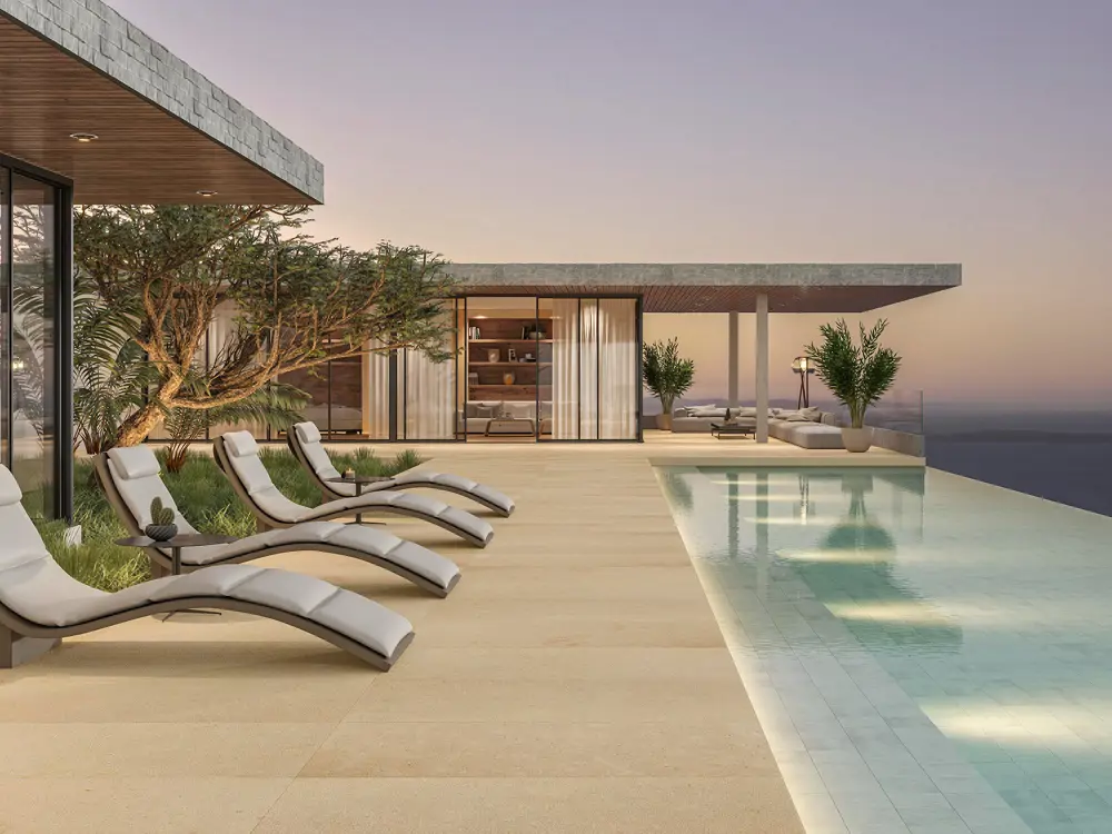 Zona terraza con suelo de piedra natural Horus Beige Texture Home, y azulejo piscina Bali Negara Matt, ambos de L’ Antic Colonial.