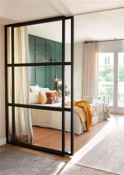Cerramiento de cristal en el dormitorio